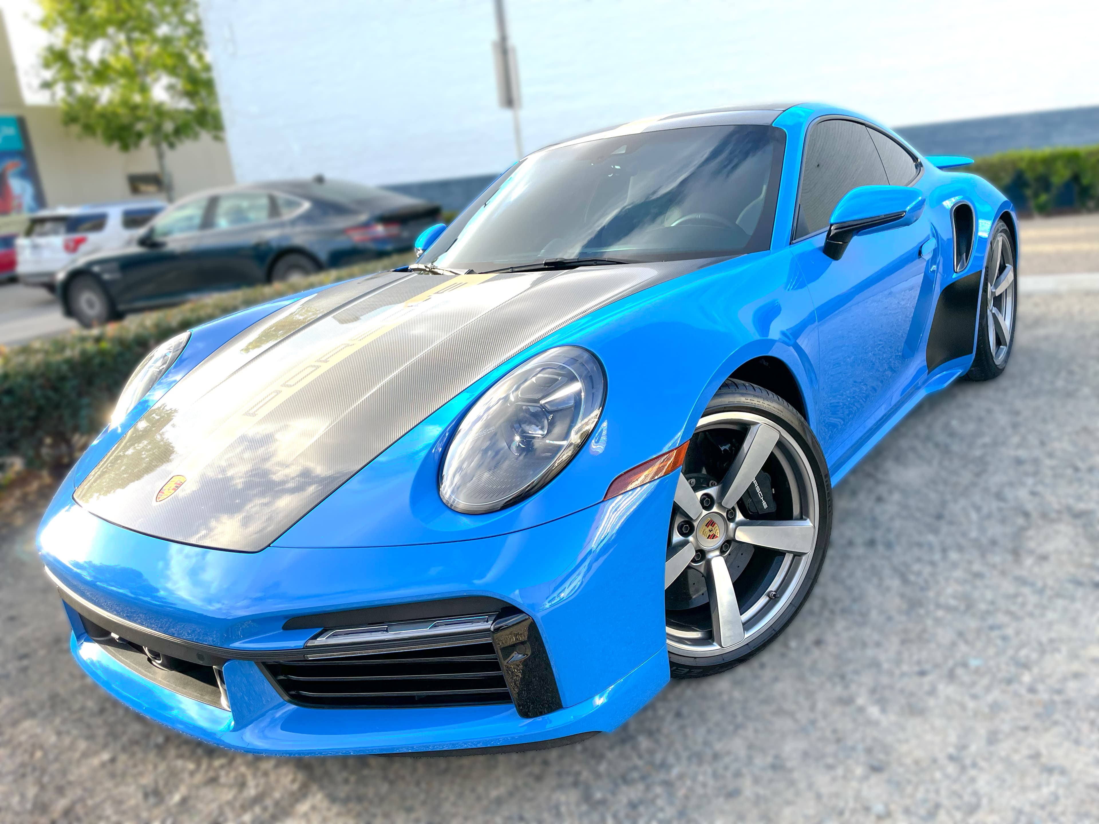 Blue Porsche window tint service preview