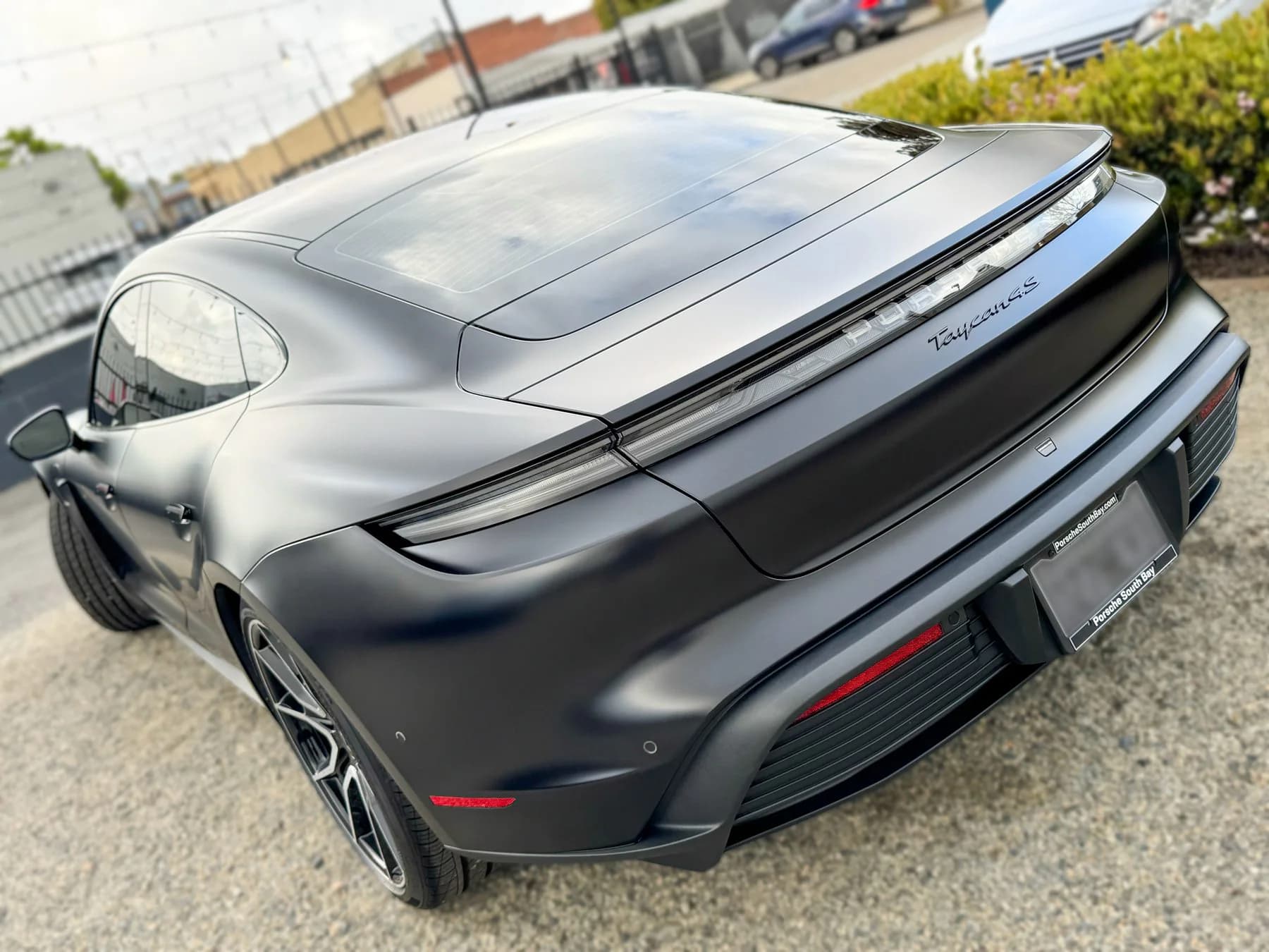 Porsche Taycan with stealth PPF and XR Plus ceramic tint