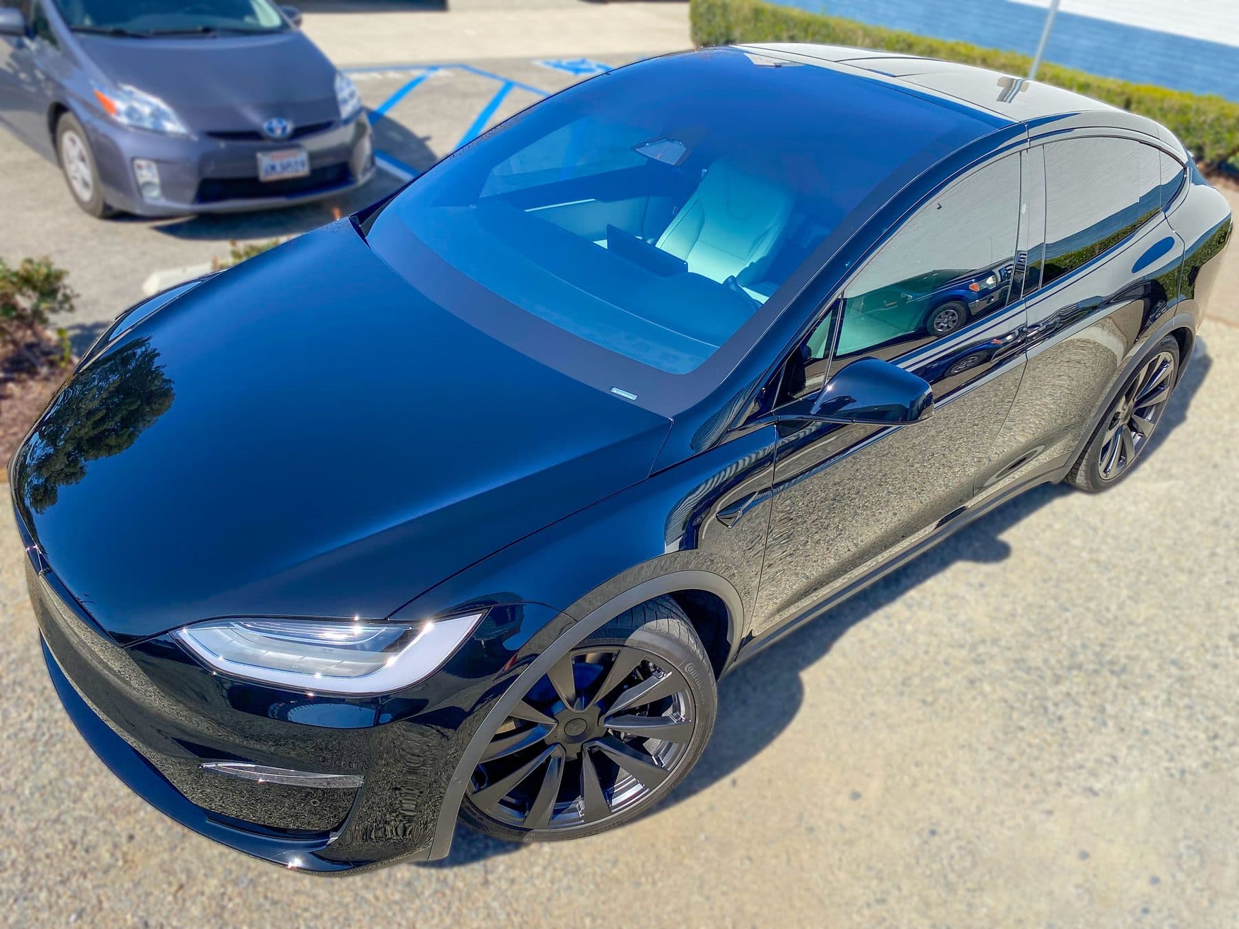 Tesla Model X large windshield ceramic tint installation in Orange County
