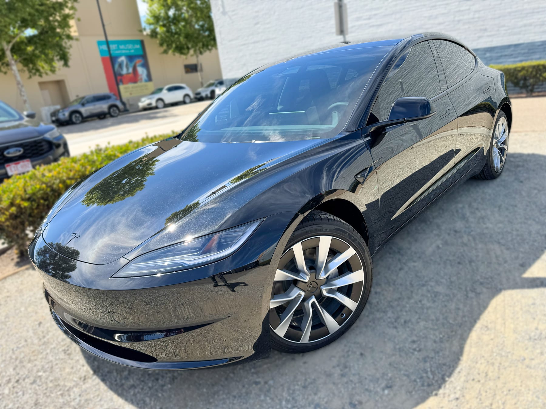 Tesla Model 3 front angle with window tint installed by OC House of Tint