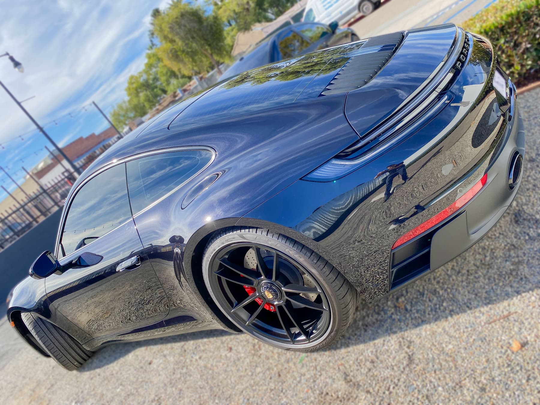 Black Porsche 911 with automotive window tint
