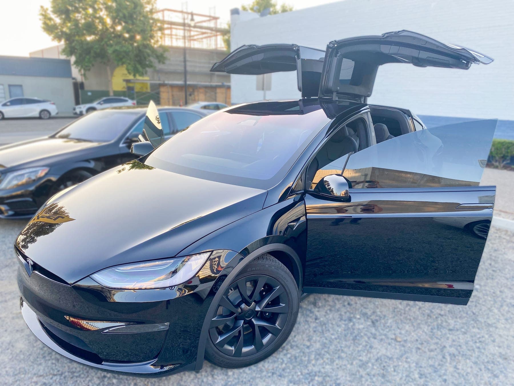 White Tesla Model X with ceramic window tint installed by OC House of Tint
