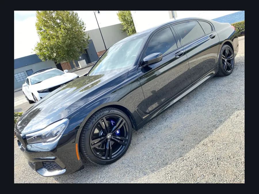 BMW 7 Series with window tint installed by OC House of Tint