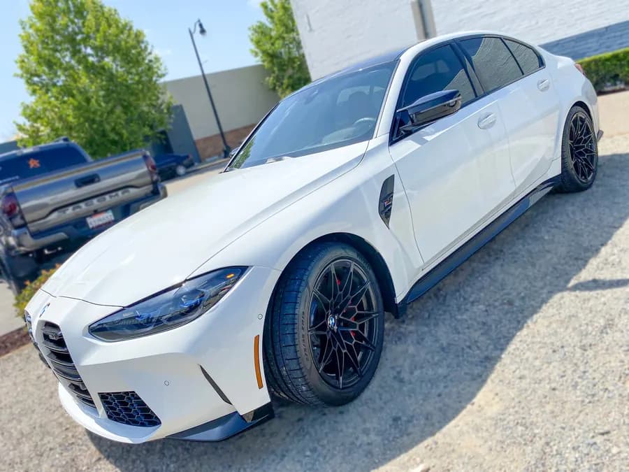 BMW i4 with window tint installed by OC House of Tint