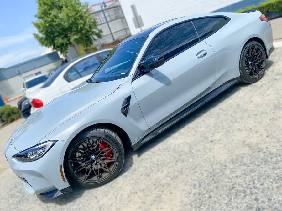 BMW M4 with window tint installed by OC House of Tint