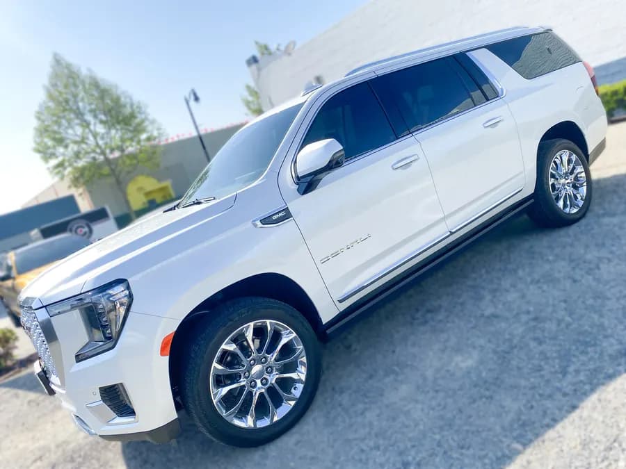 GMC Yukon Denali with ceramic window tint installed by OC House of Tint