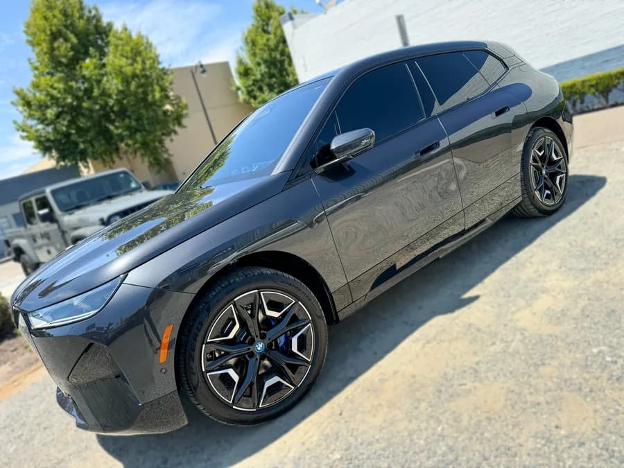 BMW i5 with window tint installed by OC House of Tint