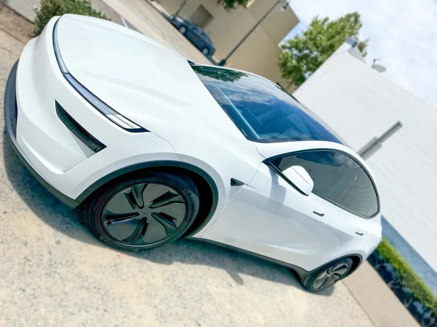 Tesla Model Y with window tint installed by OC House of Tint