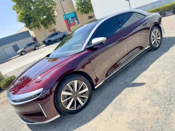 Burgundy Lucid Air viewed from the front at OC House of Tint