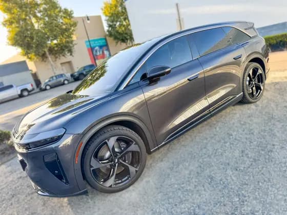 Gray Lucid Gravity showing the side windows tinted with XPEL XR Plus at OC House of Tint