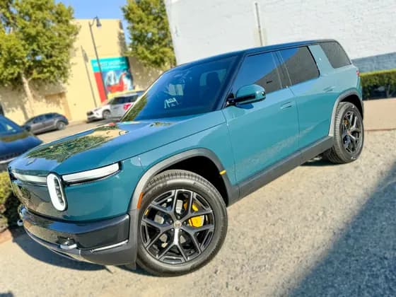 Teal Rivian R2 front three-quarter view at OC House of Tint