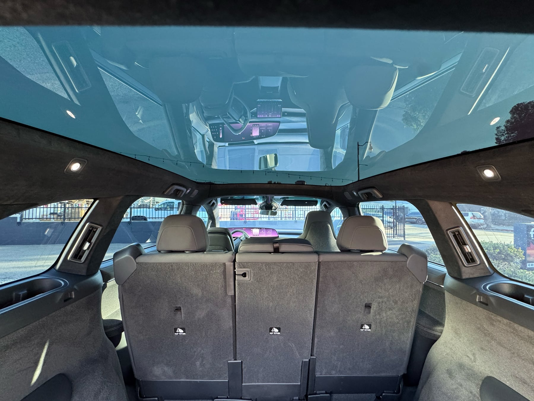 Wide interior view of Lucid Gravity roof glass and seating from the rear cabin at OC House of Tint