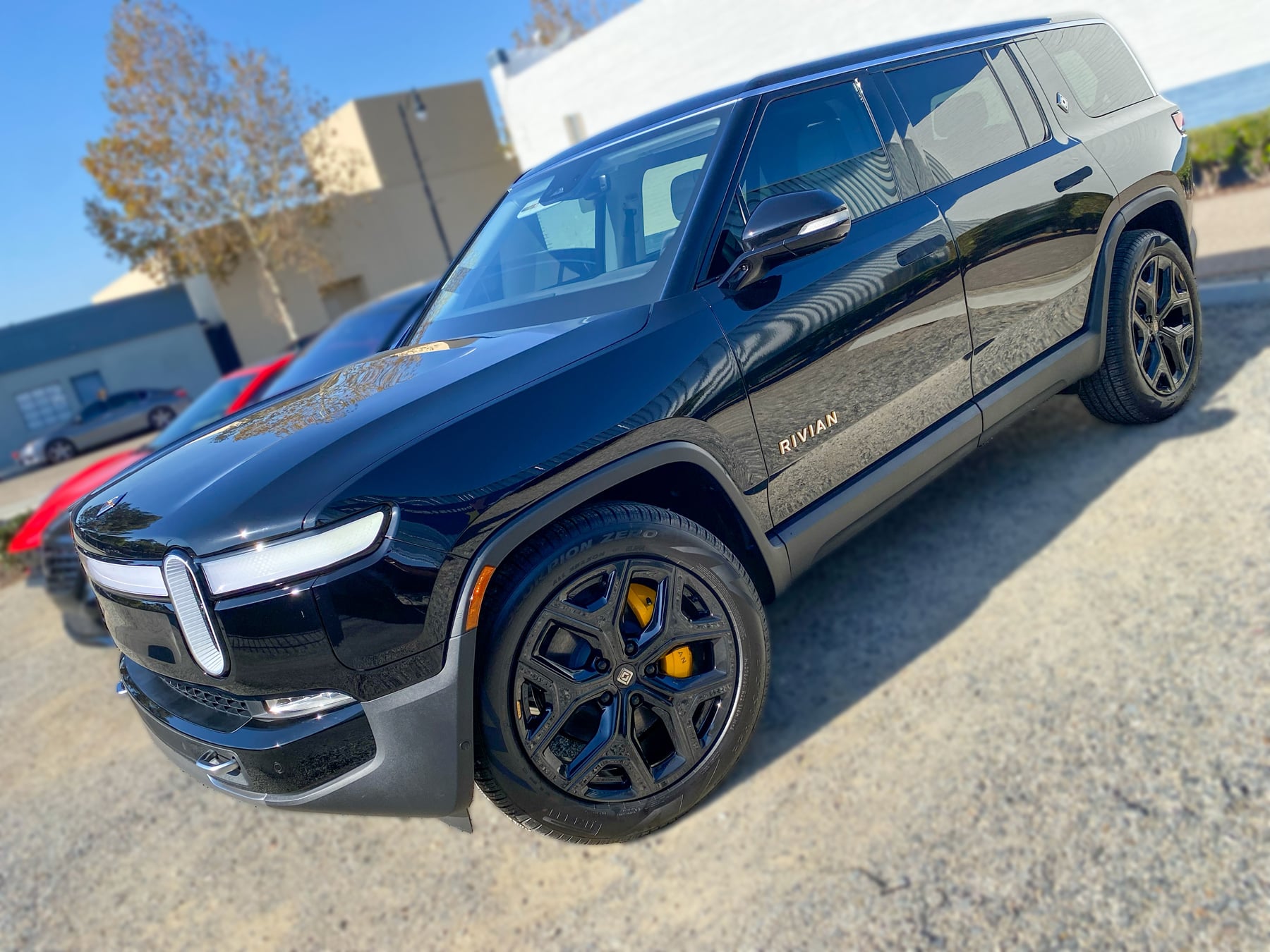 Black Rivian R1S front three-quarter view at OC House of Tint