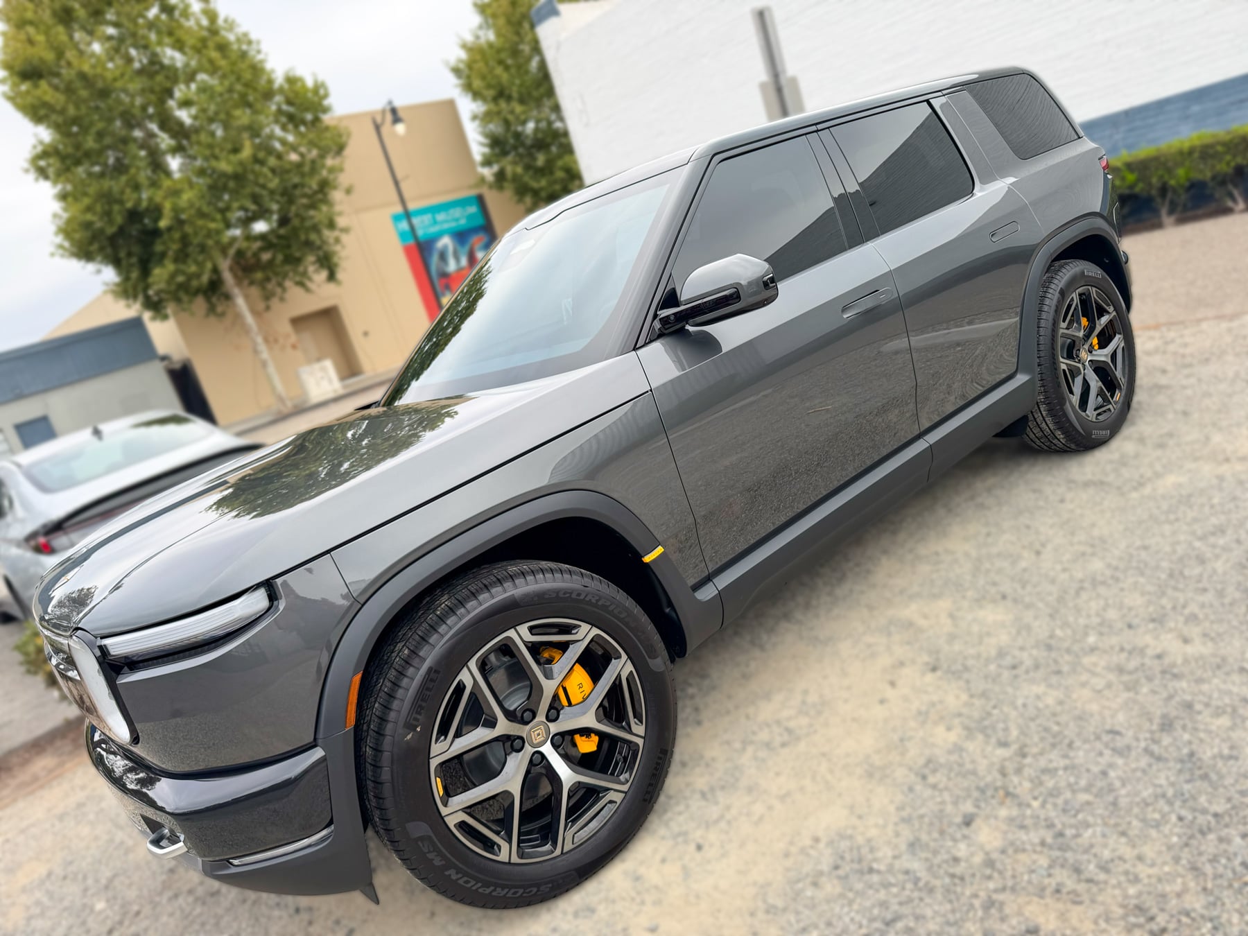 Gray Rivian R2 front three-quarter view at OC House of Tint