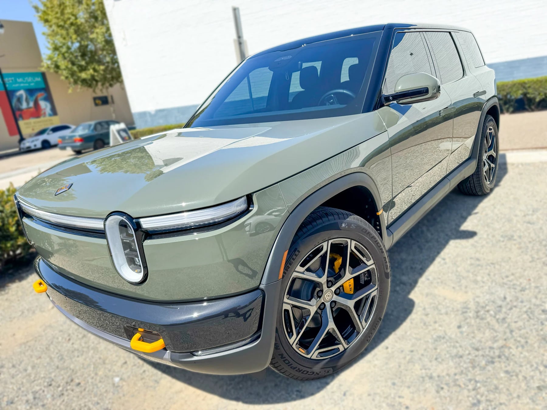 Green Rivian R2 with XPEL XR Plus tint and a 55% windshield at OC House of Tint