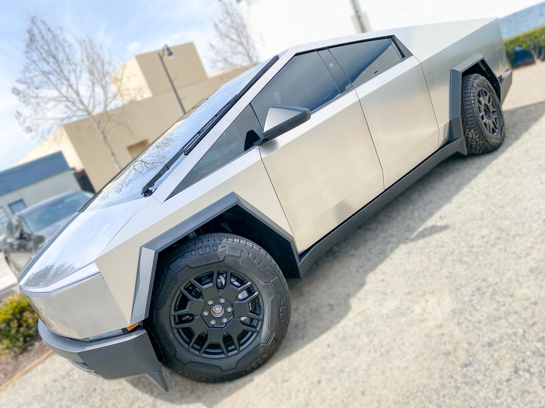 Silver Tesla Cybertruck front angle and side glass at OC House of Tint
