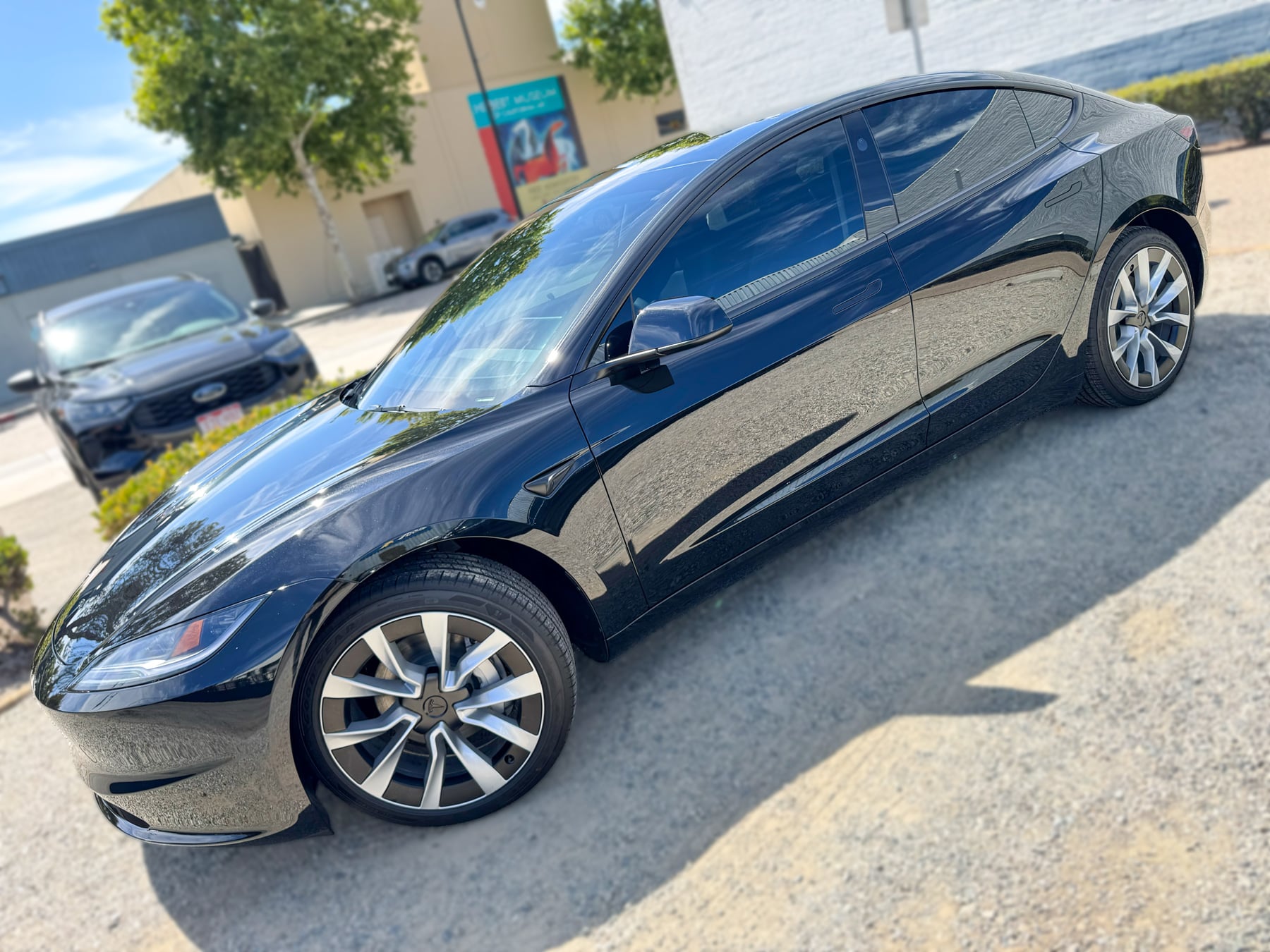 Black Tesla Model 3 side profile and window tint at OC House of Tint