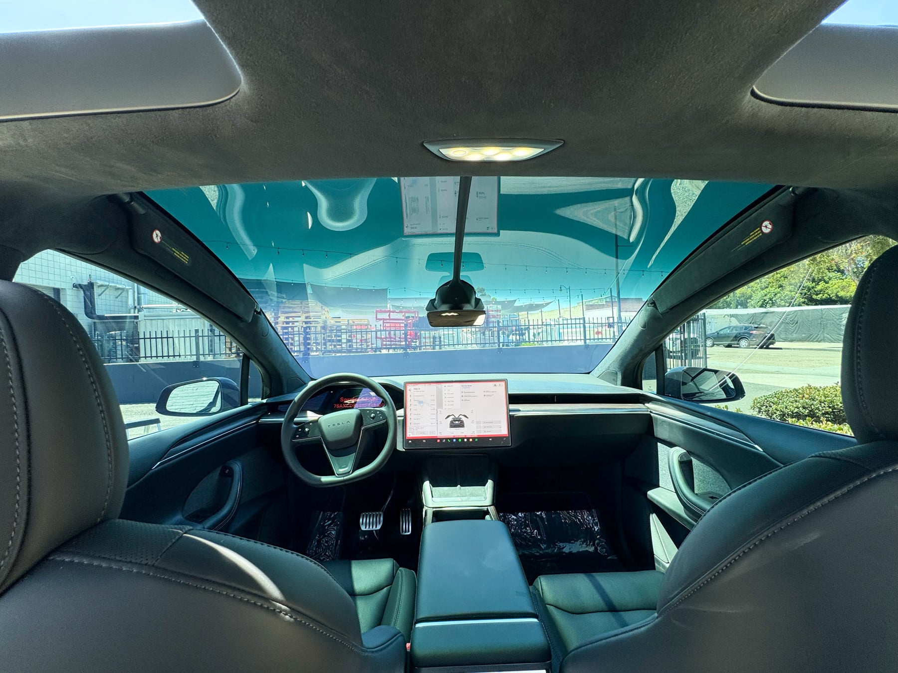 Tesla Model X panoramic windshield with one-piece 50 percent tint installed by OC House of Tint