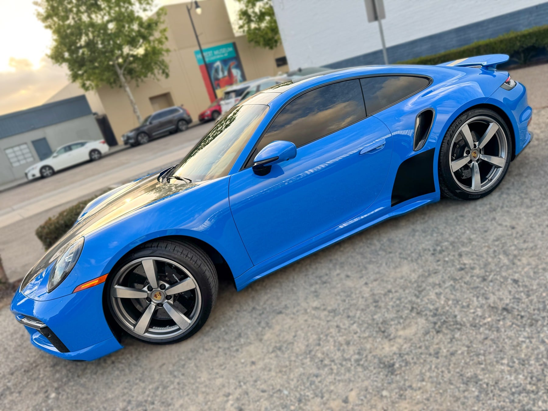 Blue Porsche 911 Turbo S showing completed window tint