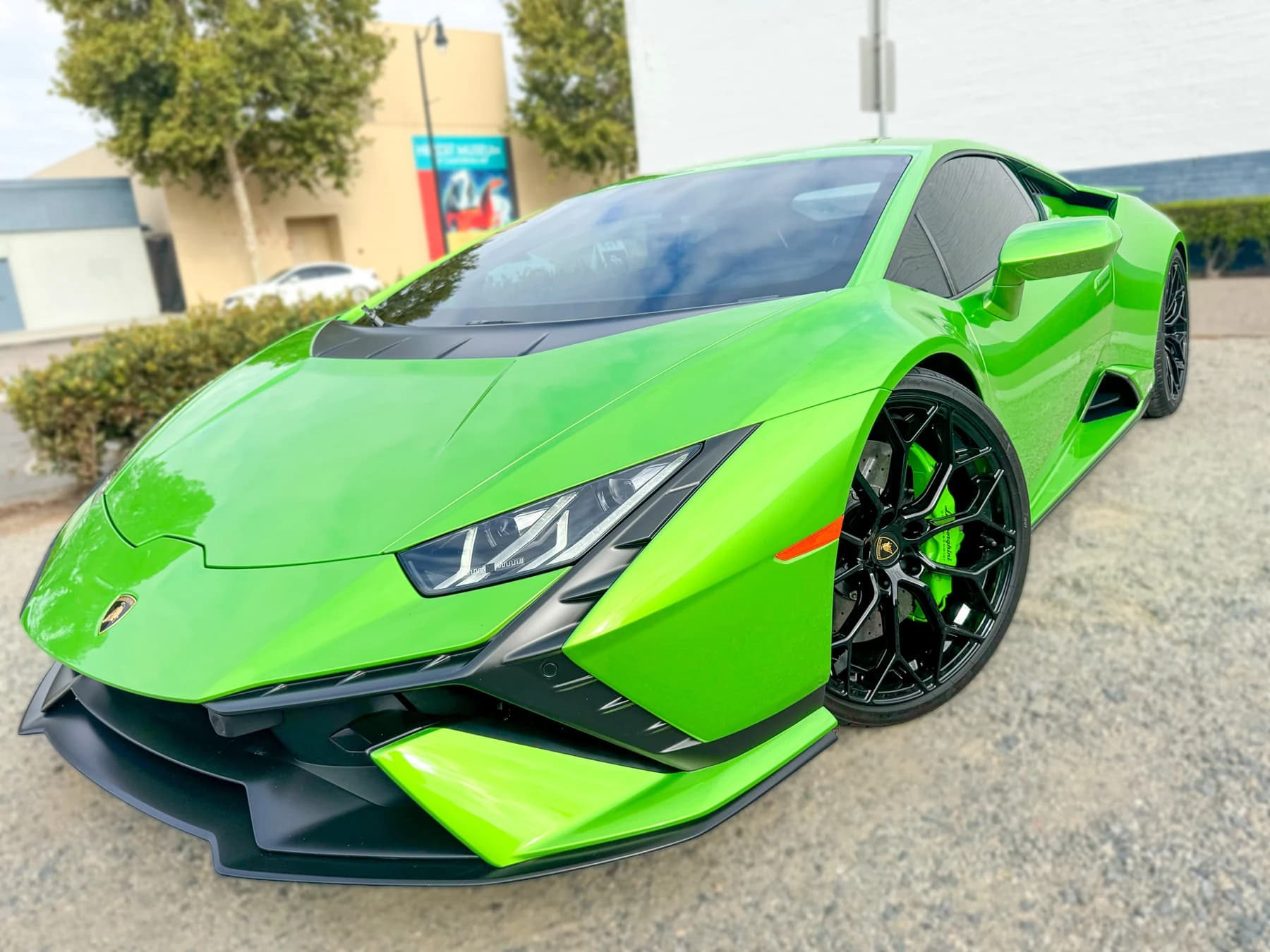 Green Lamborghini Huracán Tecnica low front view after XPEL XR Plus tint installation at OC House of Tint