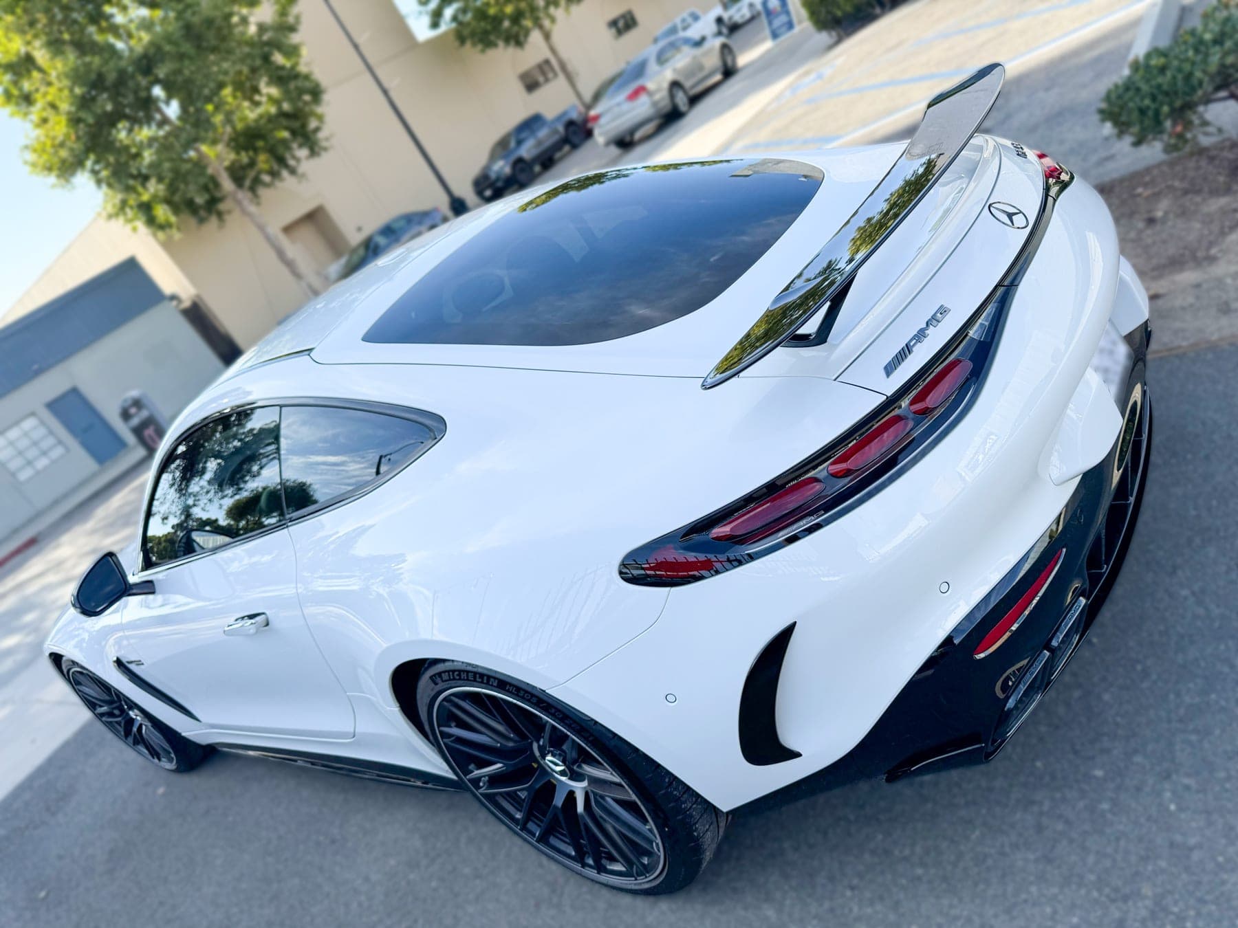 White Mercedes-AMG GT53 Coupe with ceramic window tint installed by OC House of Tint