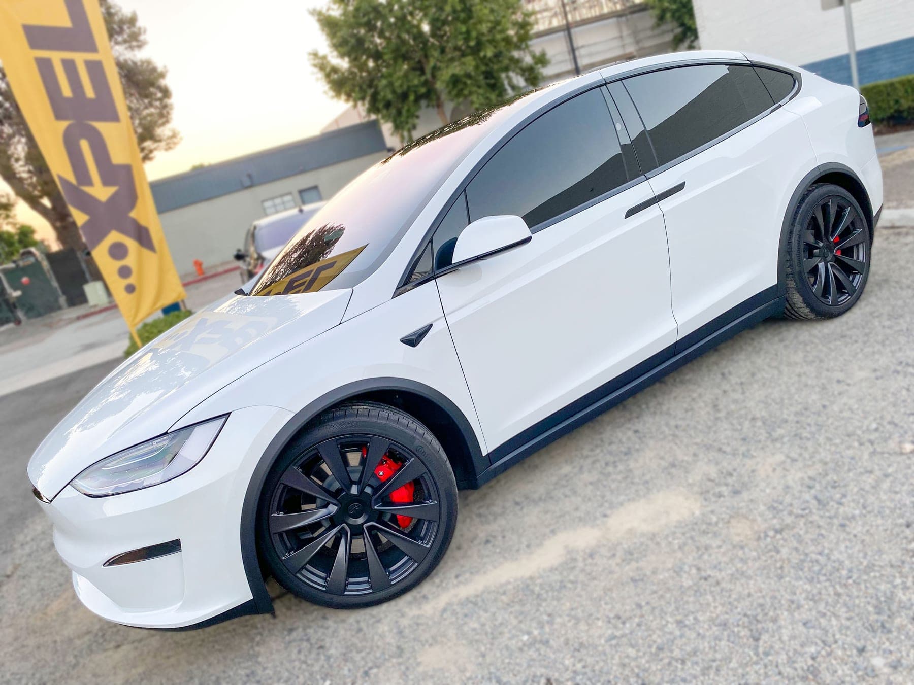 White Tesla Model X with window tint installed by OC House of Tint